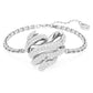 Swarovski Volta Heart Bracelet: Rhodium-Plated White Crystal Swirling Design